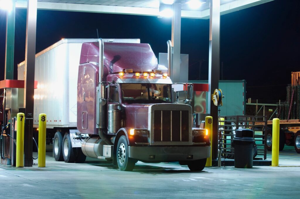 Pelham Truck Lawyer features photo truck at gas station refueling